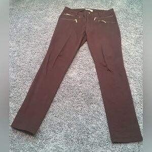 Michael Kors brown pants with zipper pockets.